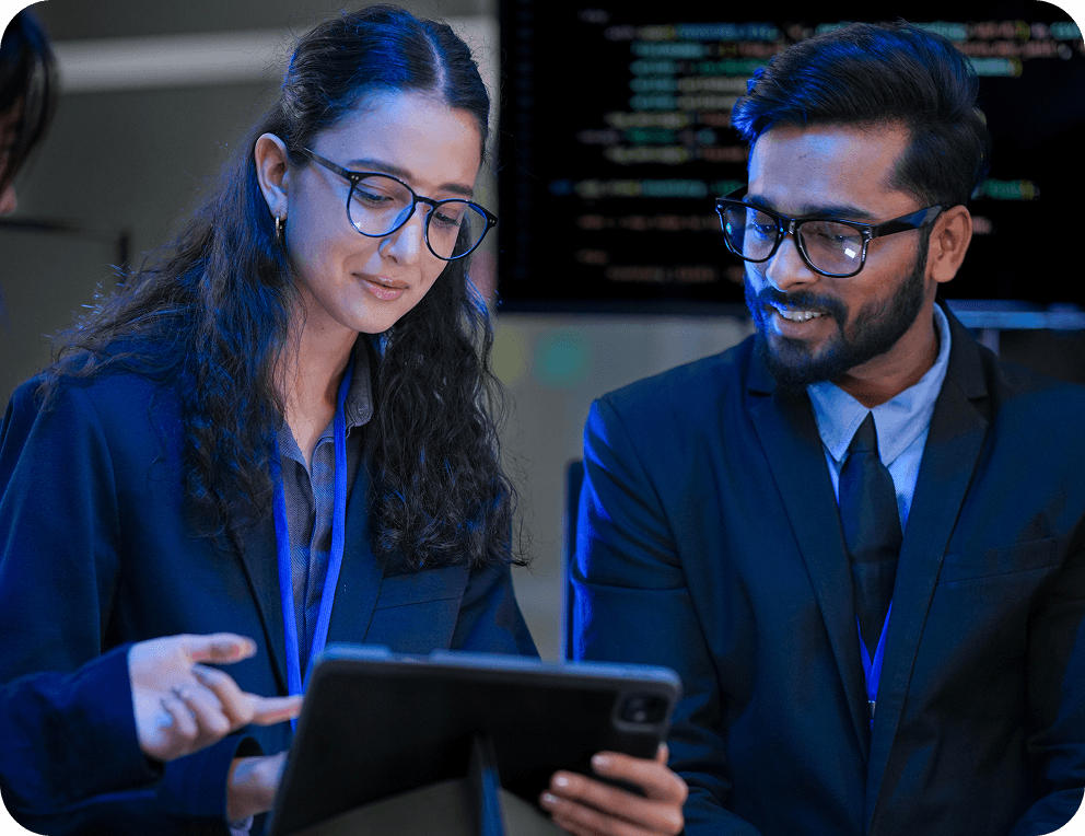 Artech team members reviewing work together